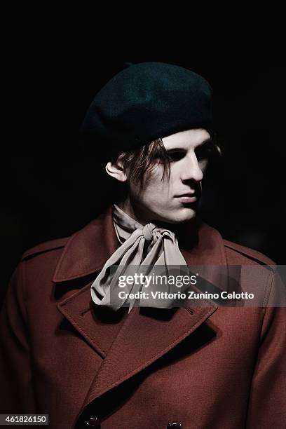 Model walks the runway during the Gucci Show as part of Milan Menswear Fashion Week Fall Winter 2015/2016 on January 19, 2015 in Milan, Italy.