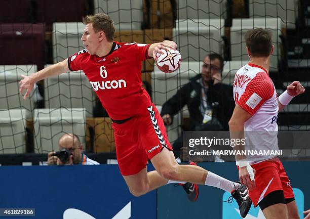 Russia's Daniil Shishkarev attempts a shot on goal during the 24th Men's Handball World Championships preliminary round Group D match between Poland...