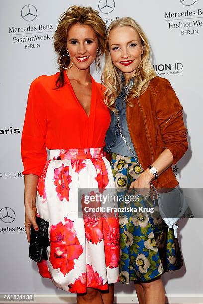 Mareile Hoeppner and Janin Reinhardt attends the Marc Cain show during the Mercedes-Benz Fashion Week Berlin Autumn/Winter 2015/16 at Brandenburg...