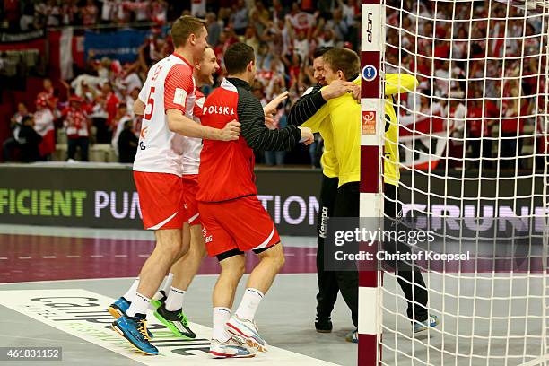 The team of Poland celebrates after the IHF Men's Handball World Championship group D match between Poland and Russia at Lusail Multipurpose Hall on...