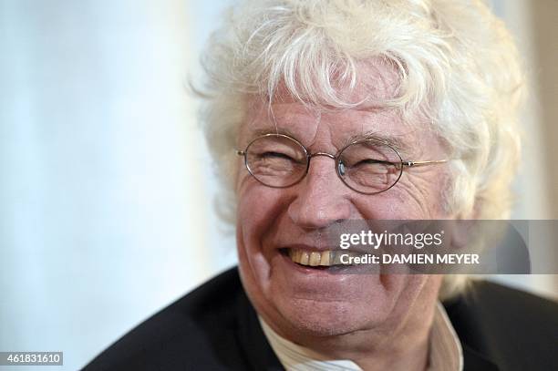 French film maker Jean-Jacques Annaud smiles during a press conference on January 20, 2015 in Rennes, western France, to promote his new movie "Le...