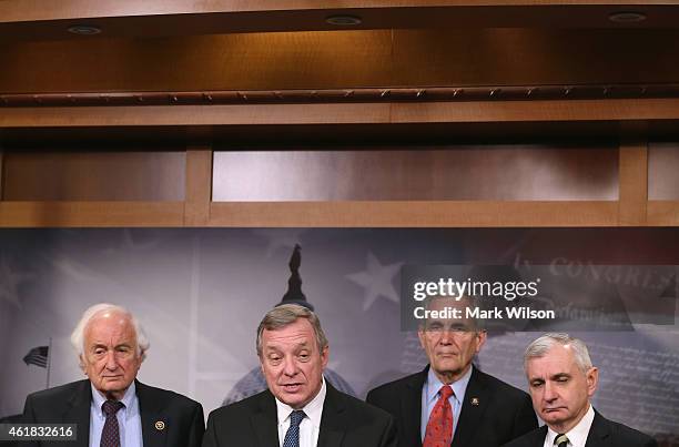 Senate Assistant Minority Leader Dick Durbin, speaks while flanked by House Ways and Means ranking member U.S. Rep. Sander Levin, , Senate Armed...