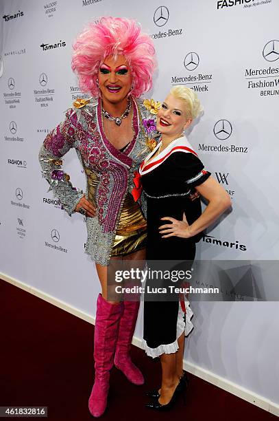 Olivia Jones and Melanie Mueller attend the Riani show during the Mercedes-Benz Fashion Week Berlin Autumn/Winter 2015/16 at Brandenburg Gate on...