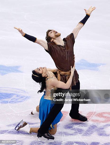 Lynn Kriengkrairut and Logan Giulietti-Schmitt skate in the free dance program during the 2014 Prudential U.S. Figure Skating Championships at TD...