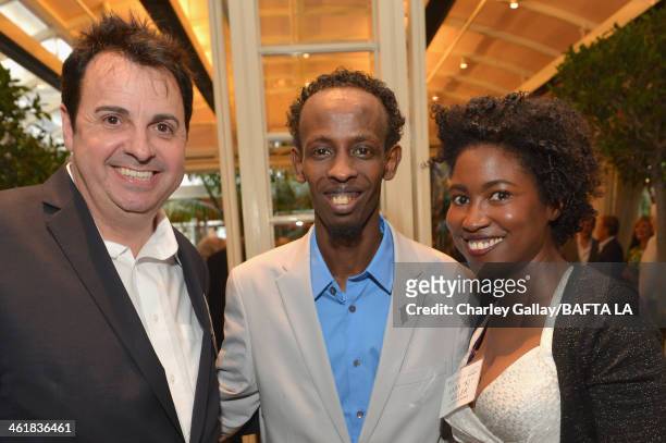 Board member Sandro Monetti, actor Barkhad Abdi, and BAFTA board member Kara "KJ" Miller attend the BAFTA LA 2014 Awards Season Tea Party at the Four...