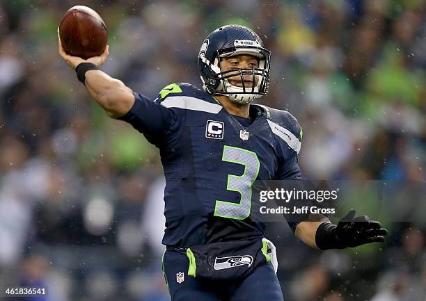 Quarterback Russell Wilson of the Seattle Seahawks throws the ball in the second half while taking on the New Orleans Saints during the NFC...