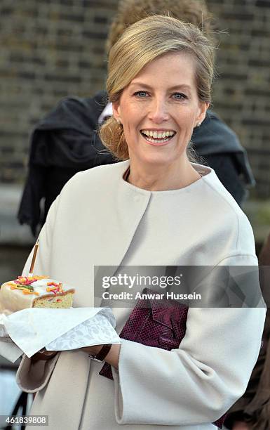 Sophie, Countess of Wessex receives a slice of birthday cake during a visit to Tomorrow's People Social Enterprises at St. Anselm's Church on her...