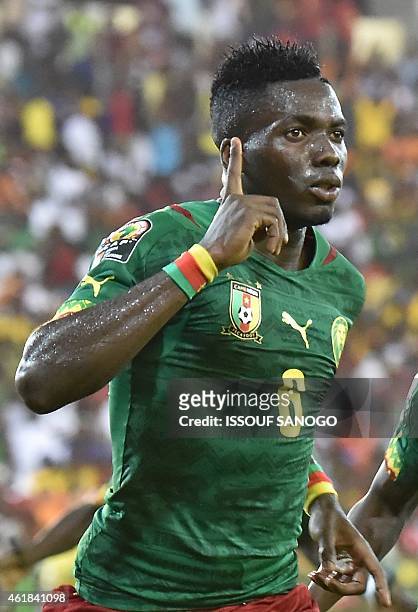 Cameroon's defender Ambroise Oyongo celebrates after scoring a goal during the 2015 African Cup of Nations group D football match between Mali and...