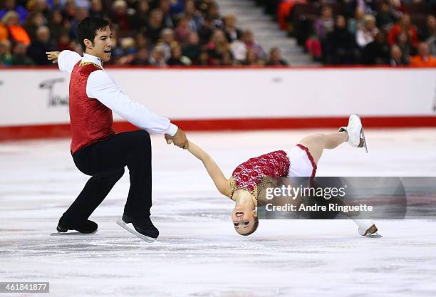 Paige Lawrence and Rudi Swiegers skate in the Senior Pair Free Program during the 2014 Canadian Tire National Figure Skating Championships at...