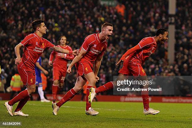Raheem Sterling of Liverpool celebrates his goal during the Capital One Cup Semi-Final First Leg between Liverpool and Chelsea at Anfield on January...