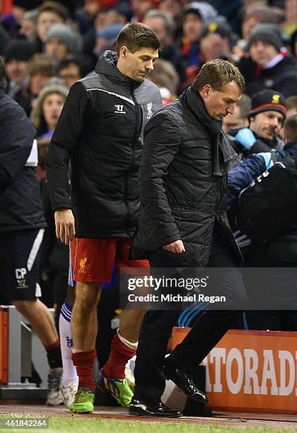 Steven Gerrard of Liverpool and Brendan Rodgers, manager of Liverpool head down the tunnel after the Capital One Cup Semi-Final first leg match...