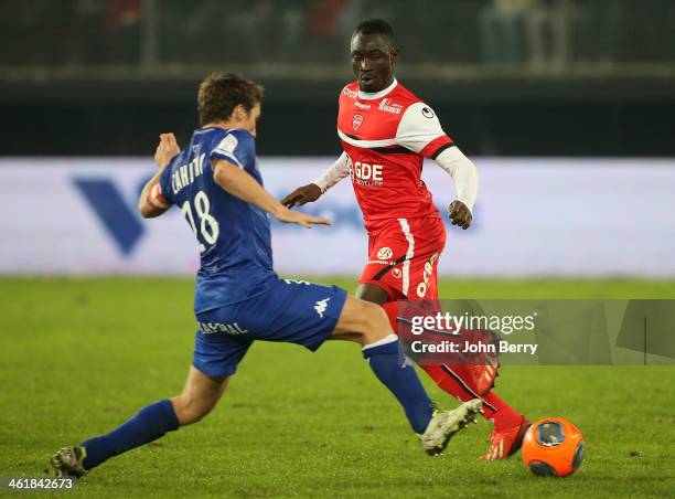 Yannick Cahuzac of Bastia and Saliou Ciss of Valenciennes in action during the french Ligue 1 match between Valenciennes FC and SC Bastia at the...