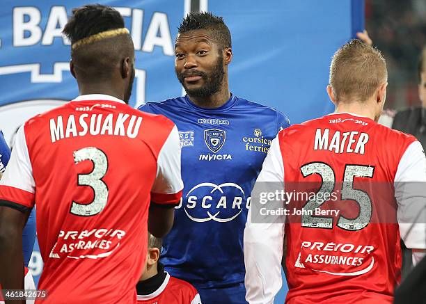 Djibril Cisse of Bastia poses with his teammates prior to the french Ligue 1 match between Valenciennes FC and SC Bastia at the Stade du Hainaut on...