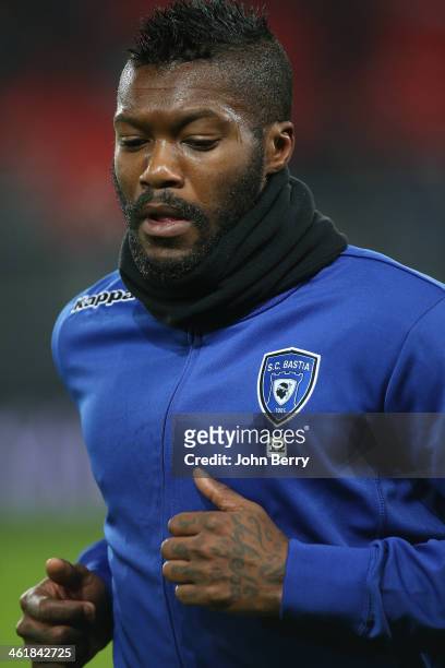 Djibril Cisse of Bastia warms up prior to the french Ligue 1 match between Valenciennes FC and SC Bastia at the Stade du Hainaut on January 11, 2014...