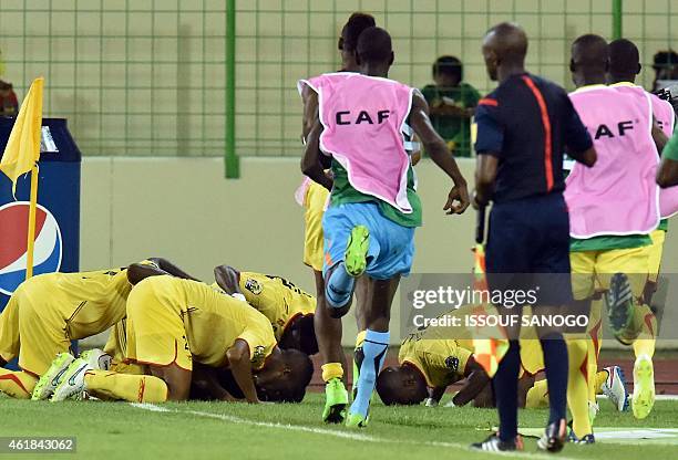 Mali's players celebrate after scoring a goal during the 2015 African Cup of Nations group D football match between Mali and Cameroon in Malabo on...