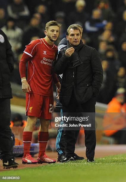 Brendan Rodgers manager of Liverpool talks to Adam Lallana of Liverpool during the Capital One Cup Semi-Final First Leg between Liverpool and Chelsea...