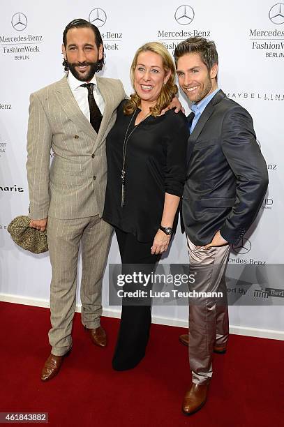 Massimo Sinato , Martina Cruse and Christian Polanc attend the Riani show during the Mercedes-Benz Fashion Week Berlin Autumn/Winter 2015/16 at...