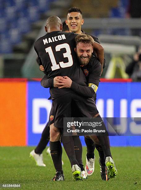 Daniele De Rossi of AS Roma celebrates with his team-mate Maicon after scoring their second goal from penalty spot during the TIM Cup match between...