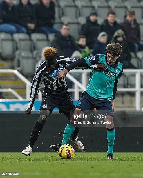 Olivier Kemen of Newcastle is controls the ball whilst being challenged by Blackburn Rovers Bradley Bauress during the U21 Premier League Cup Quarter...