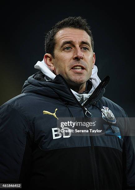 Professional development phase coach Ben Dawson of Newcastle stands sideline during for the U21 Premier League Cup Quarter Final match between...