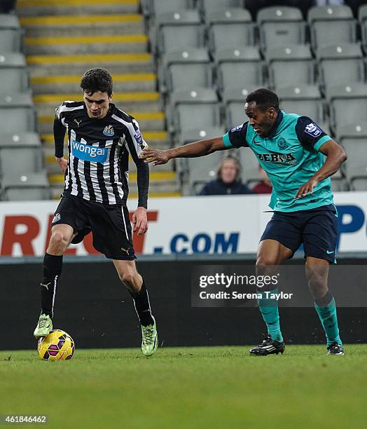 Alex Gilliead of Newcastle controls the ball whilst being pursued by Blackburns Ryan Nyambe during for the U21 Premier League Cup Quarter Final match...