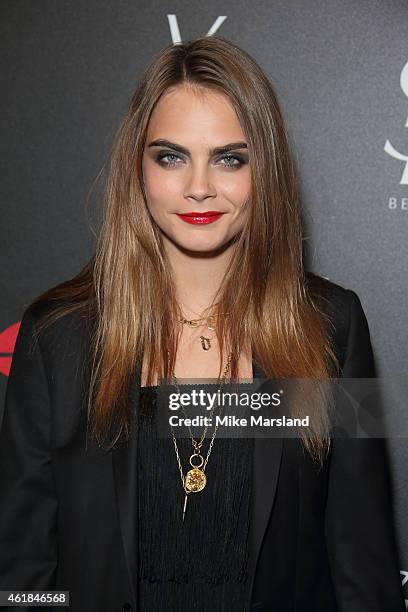 Cara Delevingne attends the YSL Beaute: YSL Loves Your Lips party at The Boiler House,The Old Truman Brewery, on January 20, 2015 in London, England.