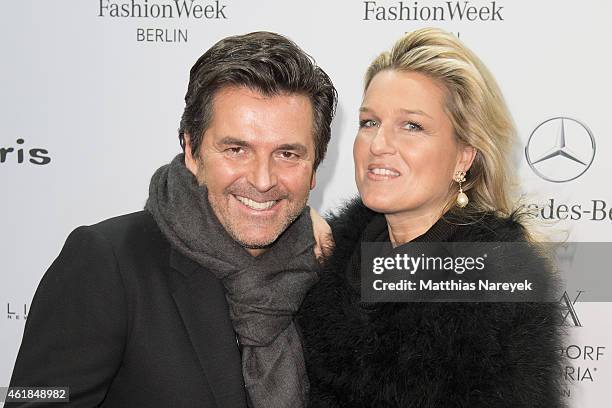 Thomas Anders and his wife Claudia attend the Riani show during the Mercedes-Benz Fashion Week Berlin Autumn/Winter 2015/16 at Brandenburg Gate on...