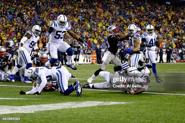 LeGarrette Blount of the New England Patriots scores a 2 yard touchdown in the first quarter against the Indianapolis Colts during the AFC Divisional...