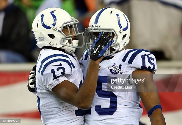 LaVon Brazill of the Indianapolis Colts celebrates with teammate T.Y. Hilton after scoring a 38 yard touchdown pass thrown by Andrew Luck in the...