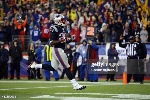 LeGarrette Blount of the New England Patriots scores his second 2 yard touchdown in the first quarter against the Indianapolis Colts during the AFC...