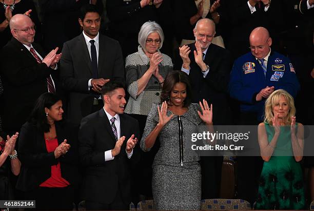 Victor Fugate of Kansas City, Missouri, Dr. Pranav Shetty of Washington, DC, Judy Gross, Alan Gross, NASA Astronaut Scott Kelly Astrid Muhammad of...