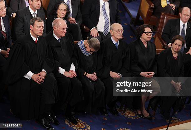 Supreme Court Chief Justice John Roberts, with Justices, Anthony Kennedy, Ruth Bader Ginsburg, Stephen Breyer, Sonia Sotomayor and Elena Kagan listen...