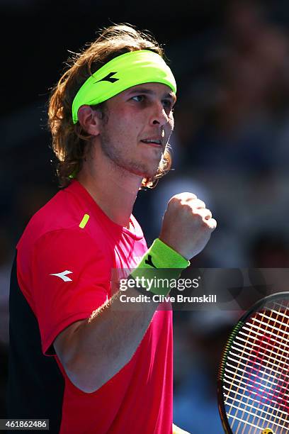 Lukas Lacko of Slovakia celebrates a point in his second round match against Grigor Dimitrov of Bulgaria during day three of the 2015 Australian Open...