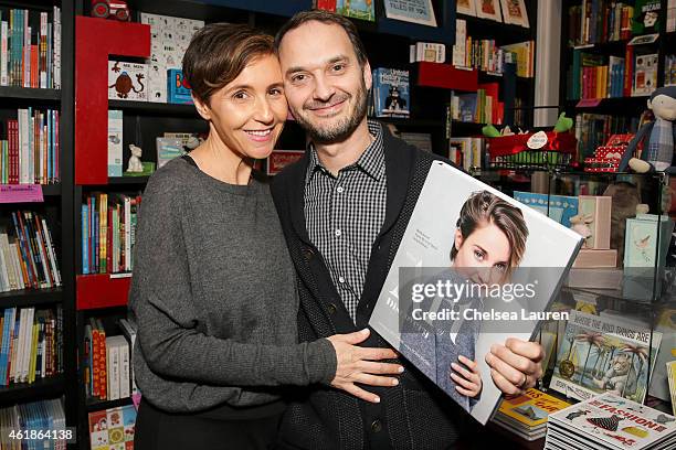 Emily Yomtobian and celebrity photographer Jeff Vespa attend the signing for his book "The Art of Discovery: Hollywood Stars Reveal Their...