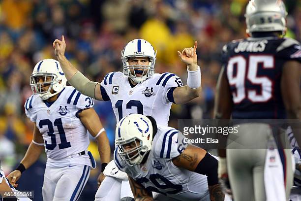 Andrew Luck of the Indianapolis Colts calls a play against the New England Patriots during the AFC Divisional Playoff game at Gillette Stadium on...