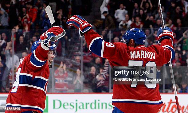 Andrei Markov of the Montreal Canadiens, celebrates after scoring the winning goal against the Chicago Blackhawks during the NHL game on January 11,...
