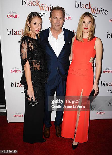 Christine Baumgartner, Kevin Costner and Lily Costner attend the premiere of "Black or White" at Regal Cinemas L.A. Live on January 20, 2015 in Los...