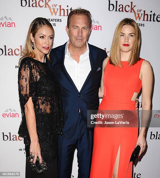 Christine Baumgartner, Kevin Costner and Lily Costner attend the premiere of "Black or White" at Regal Cinemas L.A. Live on January 20, 2015 in Los...