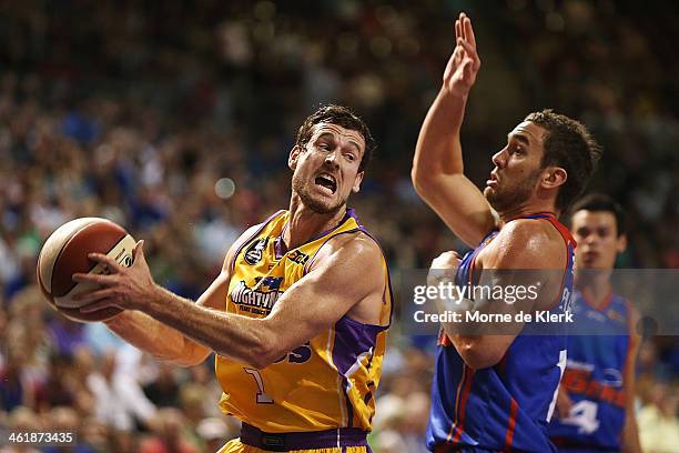 Ben Madgen of the Kings takes on Adam Gibson of the 36ers during the round 13 NBL match between the Adelaide 36ers and the Sydney Kings at Adelaide...