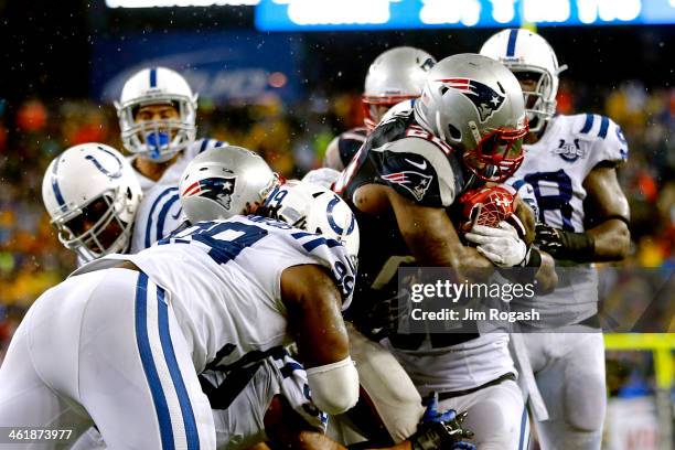 Stevan Ridley of the New England Patriots scores in the third quarter against the Indianapolis Colts during the AFC Divisional Playoff game at...