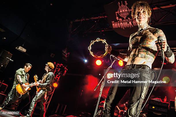 Keith Nelson, Jimmy Ashhurst and Josh Todd of American hard rock band Buckcherry performing live onstage at Hard Rock Hell, December 2, 2012.