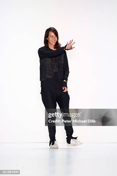 Designer William Fan walks the runway at the William Fan during the Mercedes-Benz Fashion Week Berlin Autumn/Winter 2015/16 at Brandenburg Gate on...