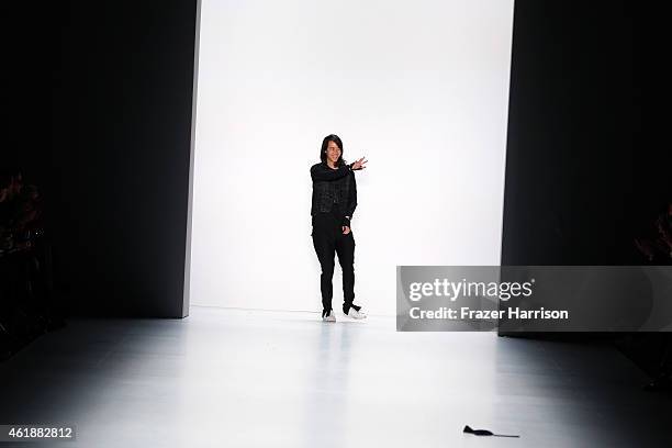 Designer William Fan walks the runway at the William Fan during the Mercedes-Benz Fashion Week Berlin Autumn/Winter 2015/16 at Brandenburg Gate on...