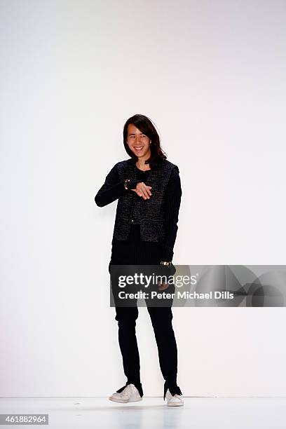 Designer William Fan walks the runway at the William Fan during the Mercedes-Benz Fashion Week Berlin Autumn/Winter 2015/16 at Brandenburg Gate on...