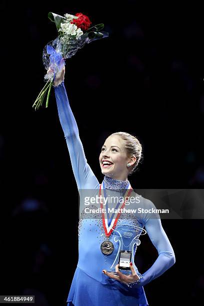 Gracie Gold celebrates on the medals podium after winning the ladies competition at the Prudential U.S. Figure Skating Championships at TD Garden on...