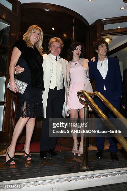 Sally Humphreys and husband Ronnie Wood with Rod Stewart and Penny Lancaster leaving the Ritz hotel in London on December 22, 2012 in London, United...