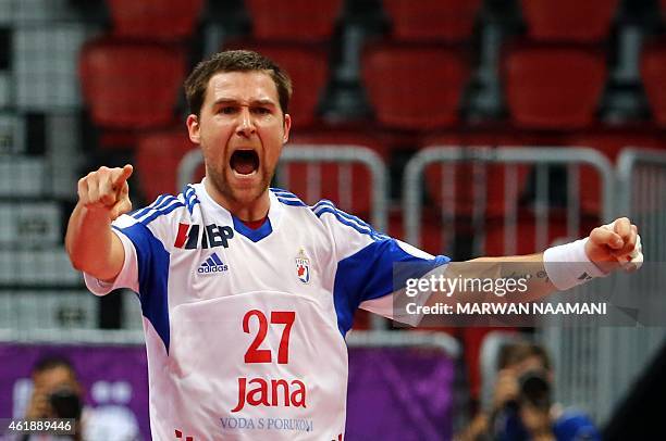 Croatia's Ivan Cupic celebrates after scoring a goal during the 24th Men's Handball World Championships preliminary round Group B match between...
