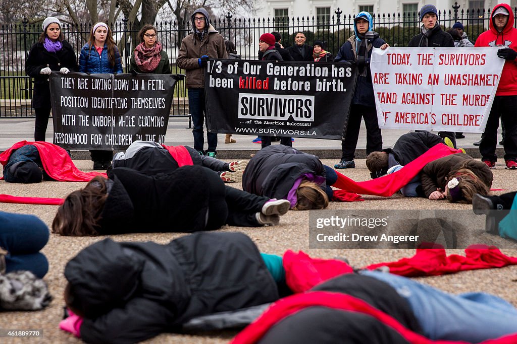 Anti-Abortion Advocates Stage "Die-In" Protest Across From White House