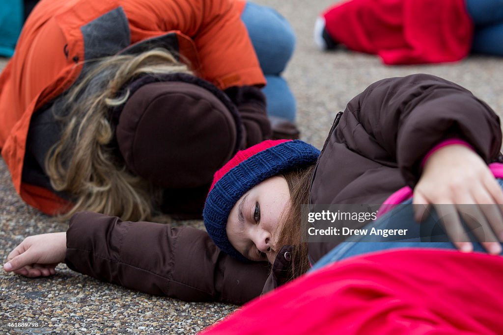 Anti-Abortion Advocates Stage "Die-In" Protest Across From White House