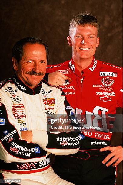 Dale Earnhardt and Dale Earnhardt Jr. Pose for a photo on October 5, 1999 in Mooresville, North Carolina.